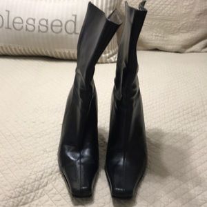 Black women’s wedge heel leather boots